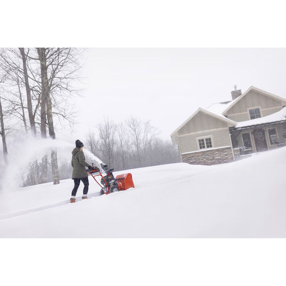 Troy-Bilt&reg;  Storm&trade; 2420 Snow Blower Clearing Driveway